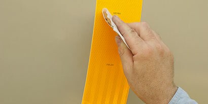 Applying reflective tape
