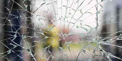 Shattered glass of an educational facility.
