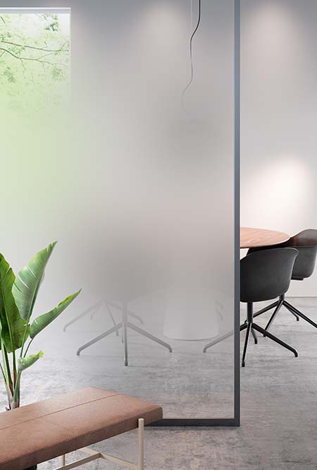 Image of an office showing a conference table obscured by a glass panel covered in FASARA Mist-W

