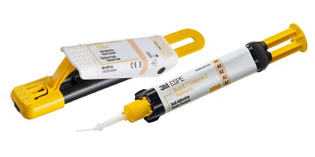 3M RelyX Unicem 2 Self-Adhesive Resin Cement syringe and clicker
