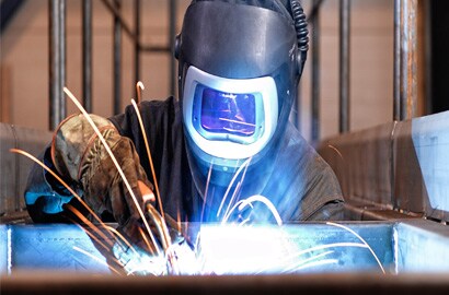 Welder with Speedglas helmet