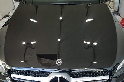 black car covered with 3M paint protection film
