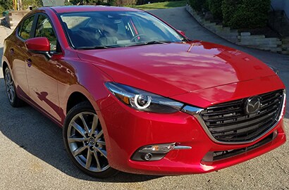 red car covered with 3M paint protection film