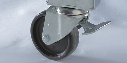 Image of a swivel caster with toe-plate for locking
