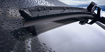up close shot of water on a windshield
