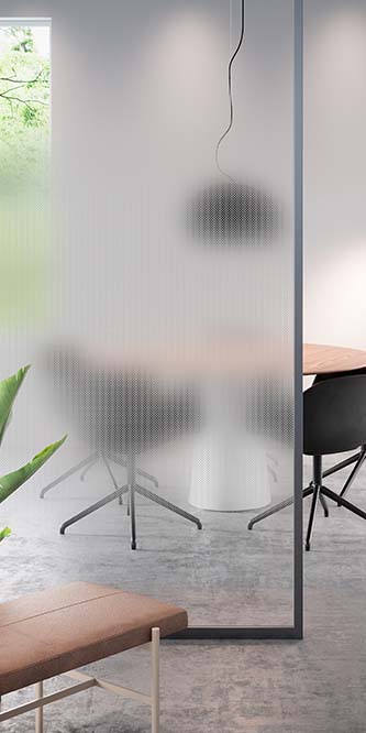 Image of an office showing a conference table obscured by a glass panel covered in FASARA Oval
