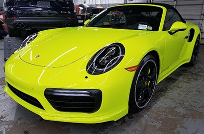yellow car covered with 3M paint protection film