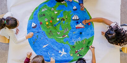 Children coloring in a clean and sustainable facility.