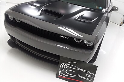 black car covered with 3M paint protection film