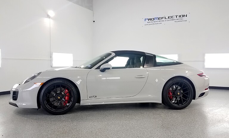 white car covered with 3M paint protection film
