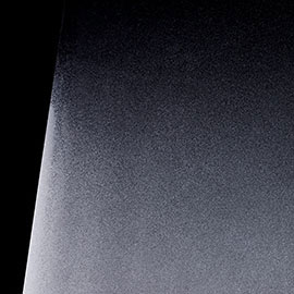 Image chowing close up of FASARA Mist pattern on a black background