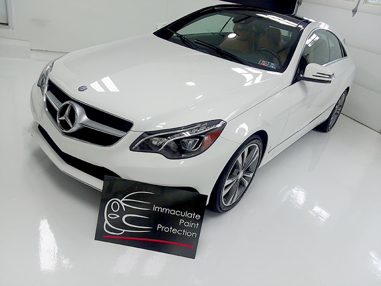 white car covered with 3M paint protection film
