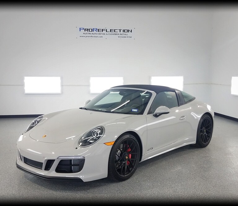 white car covered with 3M paint protection film

