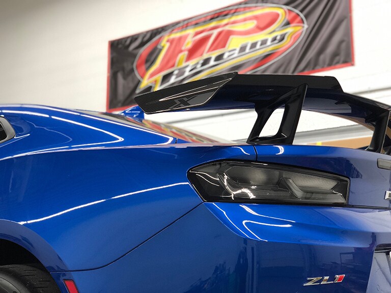 blue car tailight view with 3M paint protection film
