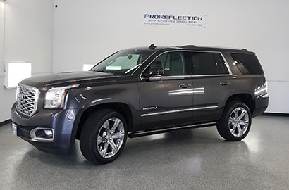 black car covered with 3M paint protection film