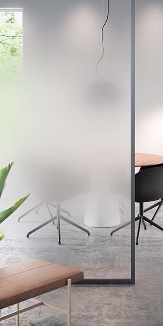 Image of an office showing a conference table obscured by a glass panel covered in FASARA Sand
