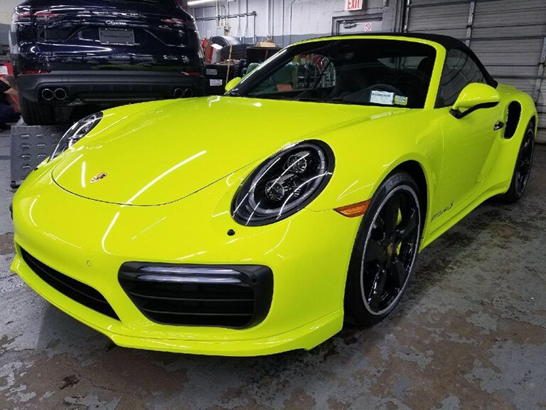 yellow car covered with 3M paint protection film
