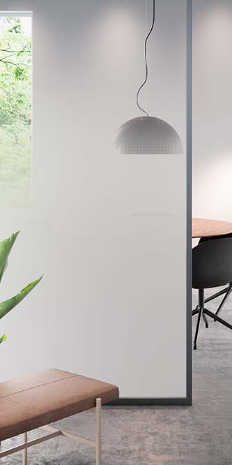 Image of an office showing a conference table obscured by a glass panel covered in FASARA Illumina Seamless-S2
