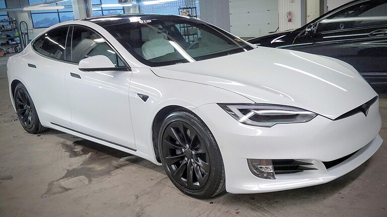 white car covered with 3M paint protection film
