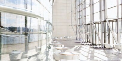 A very clean commercial lobby shining in bright natural light.