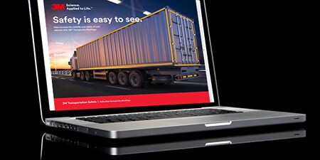 Laptop with reflective conspicuity tape on 18 Wheeler for ebook download
