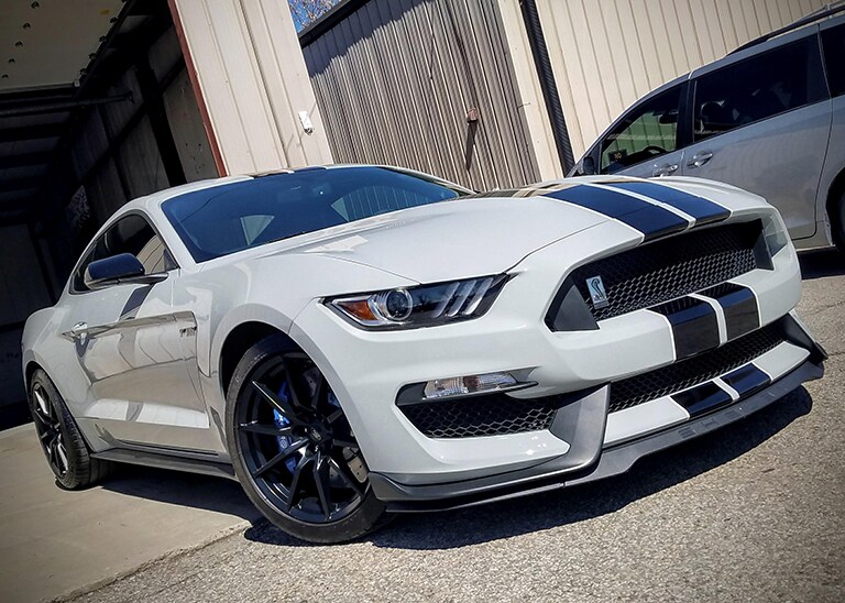 white car covered with 3M paint protection film
