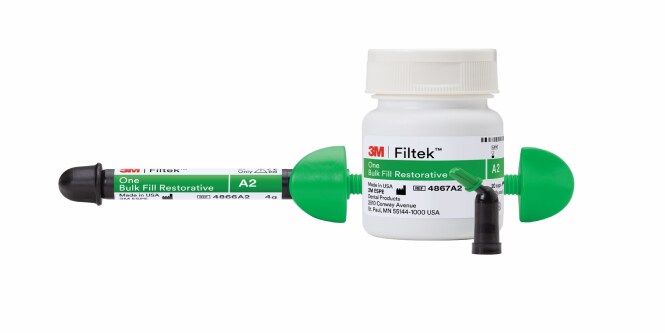 close up of hands holding 3M™ Filtek™  One Bulk Fill Restorative syringe
