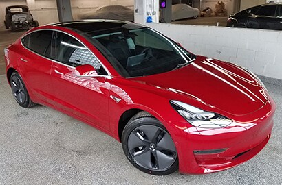 red car covered with 3M paint protection film