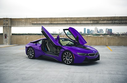 Car Wrapped with Gloss Plum Explosion Wrap