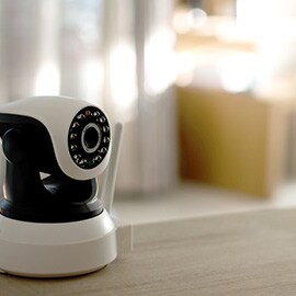 a close of photo of a smart home security camera.