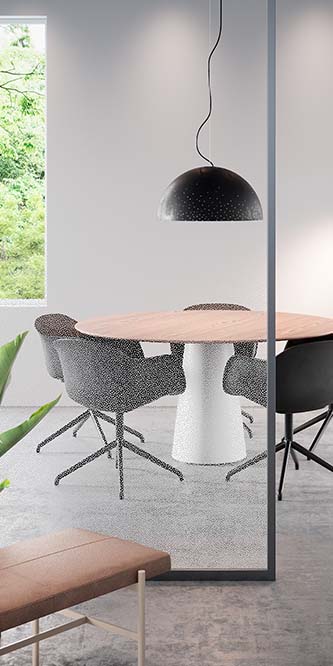 Image of an office showing a conference table obscured by a glass panel covered in FASARA Pop-S
