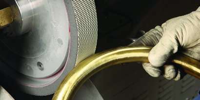 image of metal being polished
