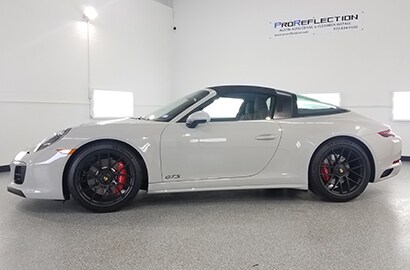white car covered with 3M paint protection film