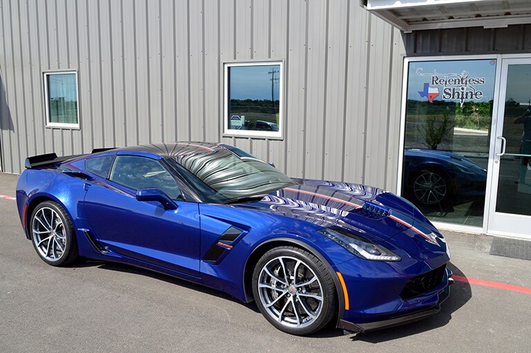 blue car covered with 3M paint protection film
