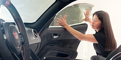 woman applying window films  Link: new page being created

