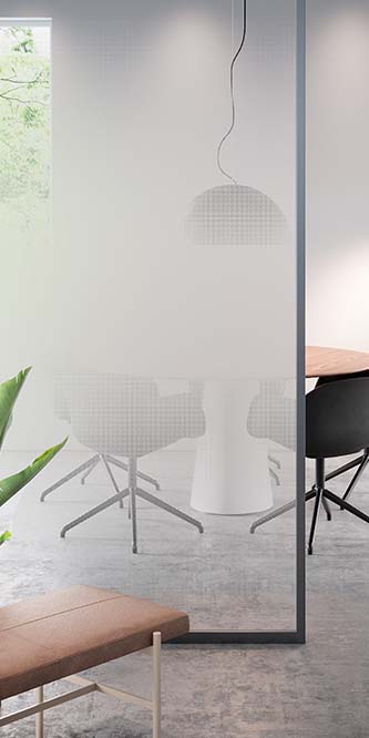 Image of an office showing a conference table obscured by a glass panel covered in FASARA Illumina Seamless-W2
